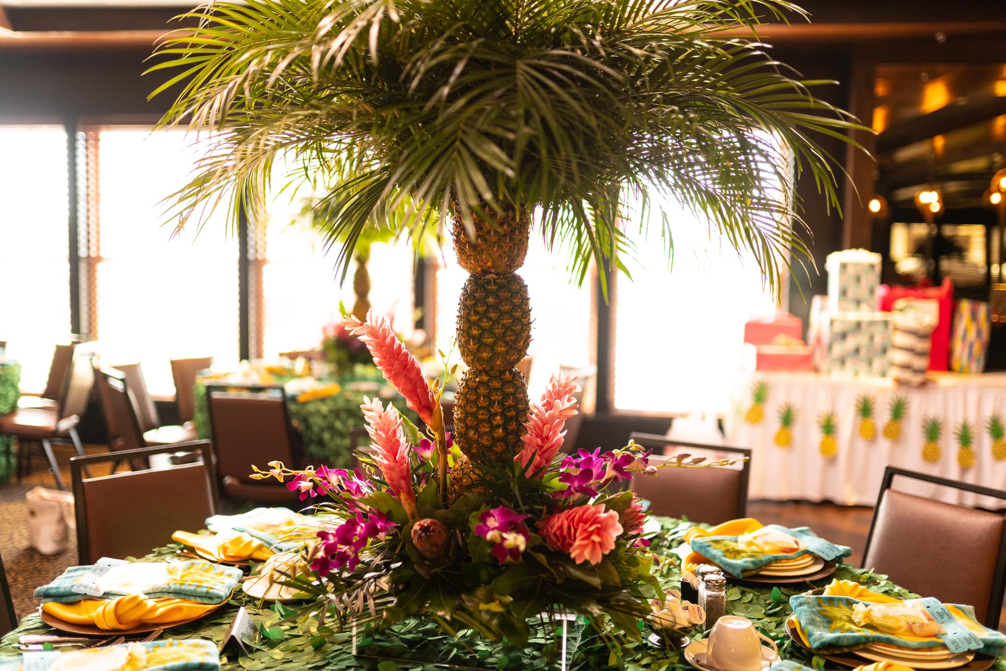 Tropical pineapple centerpiece on a banquet table