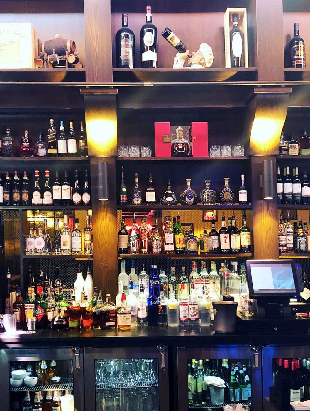 The bar at Da Francesco's, stocked with wines and spirits