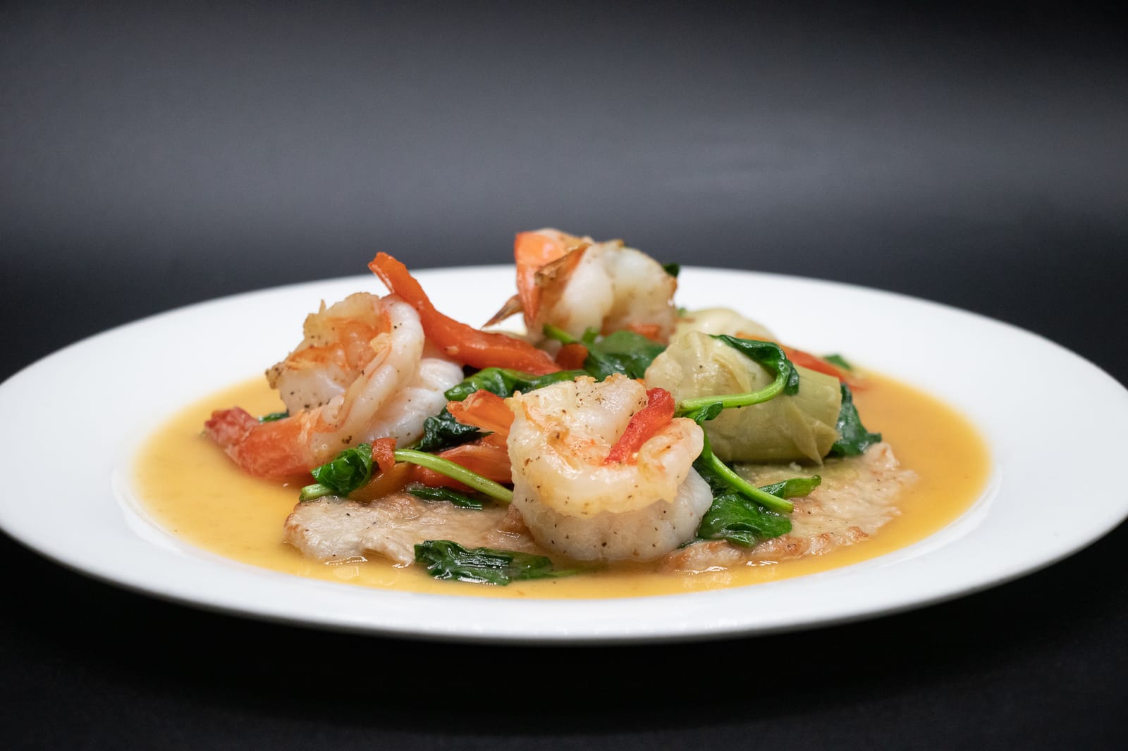 Shrimp scampi with spinach and artichokes