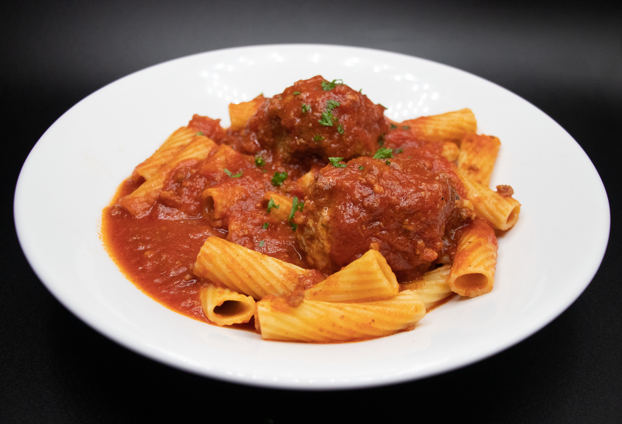 Rigatoni with Mamma's meatballs in our famous red sauce